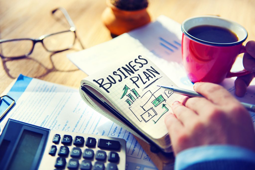35337758 - businessman writing business plan growth concept